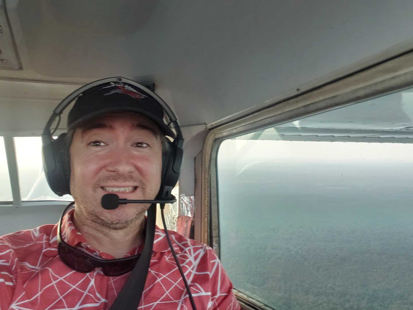 Picture of me in the cockpit being a weirdo with a big smirky mouth